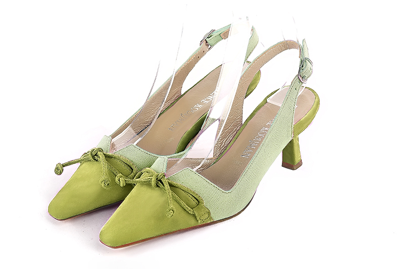Pistachio green women's open back shoes, with a knot. Tapered toe. Medium spool heels. Front view - Florence KOOIJMAN